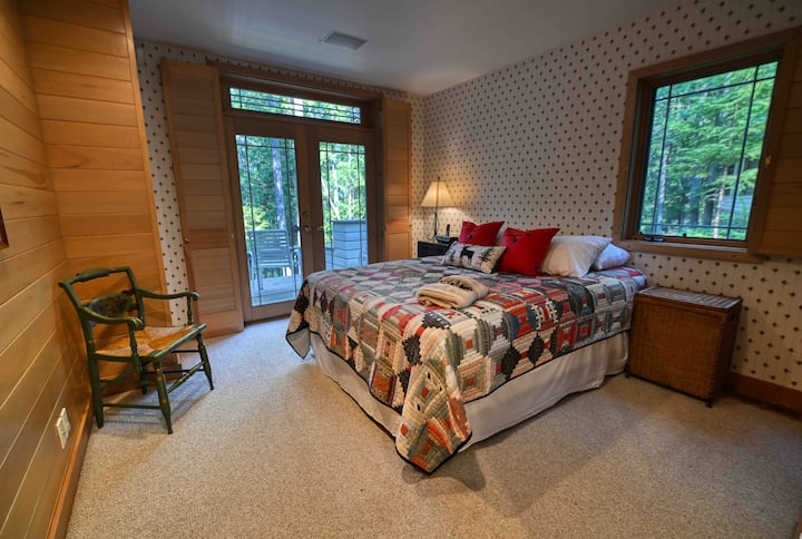 The master bedroom has a queen bed and ensuite bath.  There is a private deck.