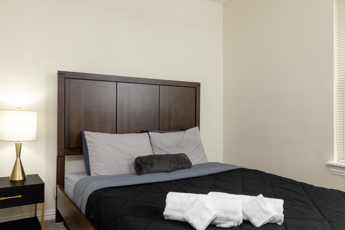 Bedroom 2 - queen bed and attached bathroom.