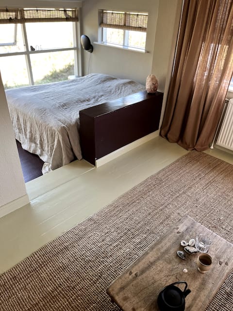 Top performing Airbnb: Warm simplicity and a green view in the middle of Klitmøller in Thisted