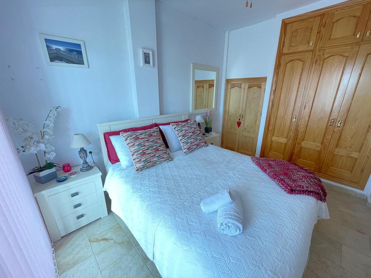 Habitación principal con cama tamaño king