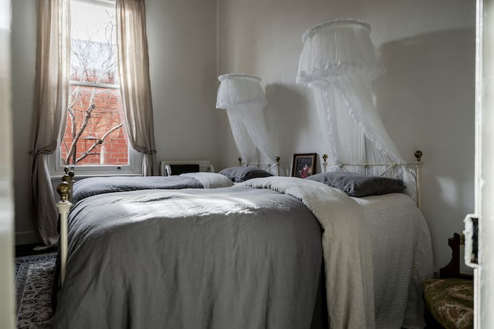 All bedrooms are perfect for adults or children.  Charming vintage beds, quality mattresses, goose down quilts & luxury French flax bedding linen ensure a perfect sleep. When you wake, draw the curtains to enjoy the birds visiting the feeder outside.