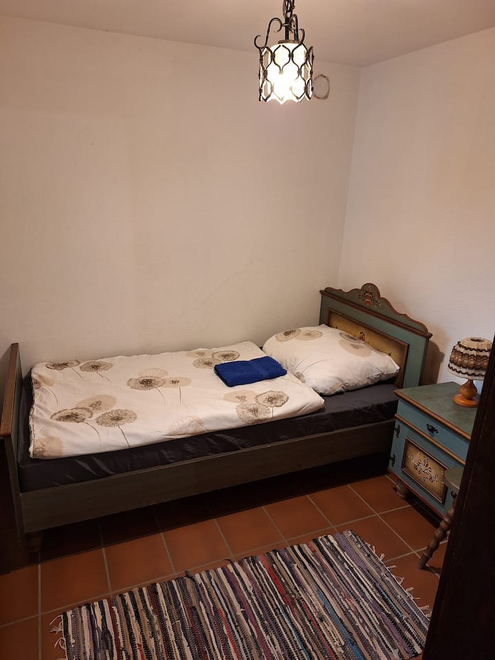 Spavaća soba s krevetom za jednu osobu u prizemlju