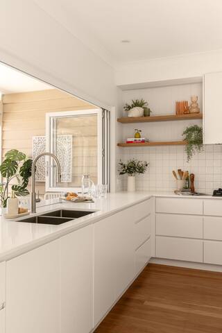 Elegant Queenslander Home with Tropical Pool Area gallery image 5