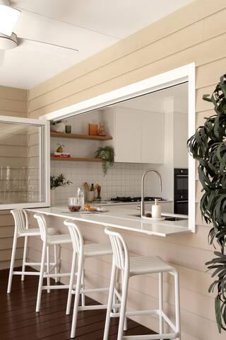 Elegant Queenslander Home with Tropical Pool Area gallery image 2