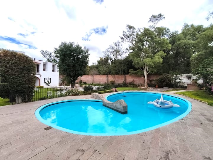Mexican colonial-style house with a private pool.