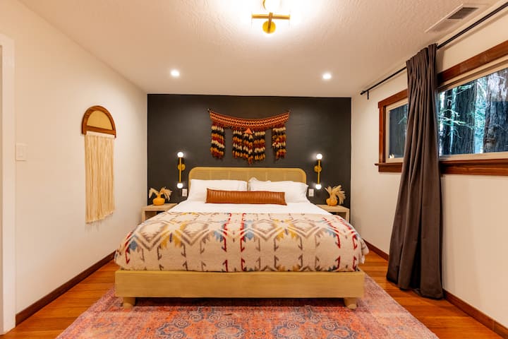 The main home has 1 bedroom with a king sized bed. There is a full closet, extra linens and a pack and play in this room as well as a full length mirror. The full bathroom is across the hall from the bedroom.