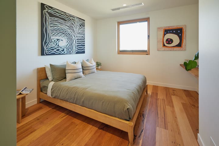 Bedroom 1 - Full sized bedroom, Queen bed featuring InBed Linen, Artwork from Vivien Anderson Gallery, built in desk.