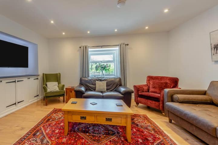 Segunda sala de estar, planta baja, con sofá cama doble