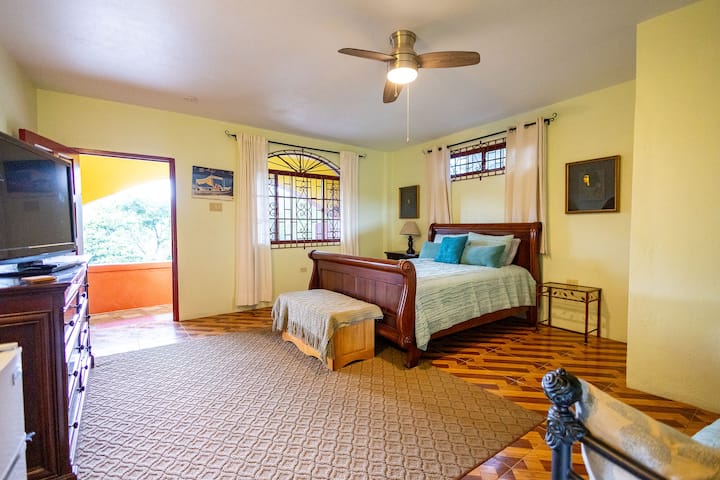 A spacious and inviting suite with a king bed and cozy daybed — perfect for couples, small families, or solo travelers. Thoughtfully styled with natural textures and soulful decor, this space offers a grounded, peaceful place to rest and reconnect.

