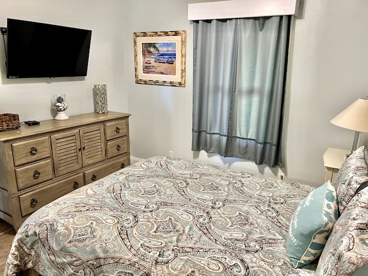 Queen Bedroom with large closet and bath access.