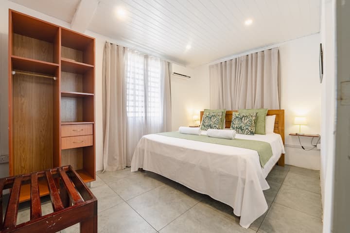 Bedroom three with queen bed