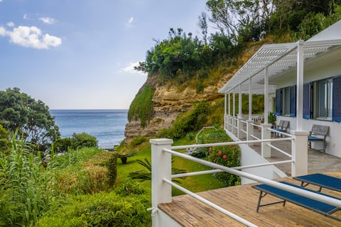 Beach house, immersed in the ocean and nature