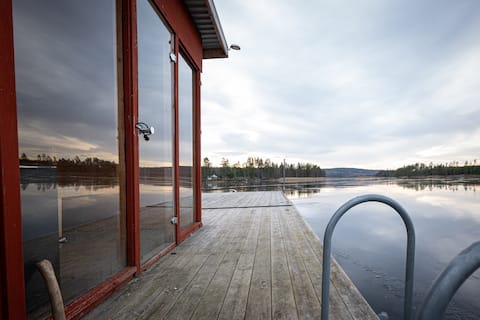 Lake view with private sauna and boat