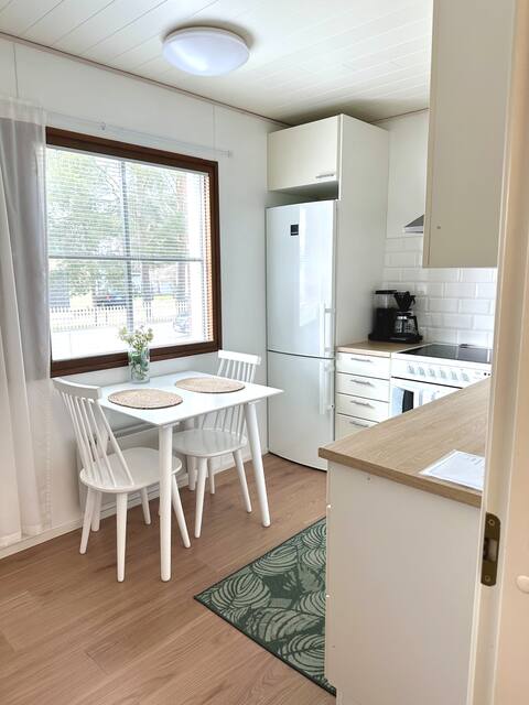 Spacious studio with sauna, patio and carport
