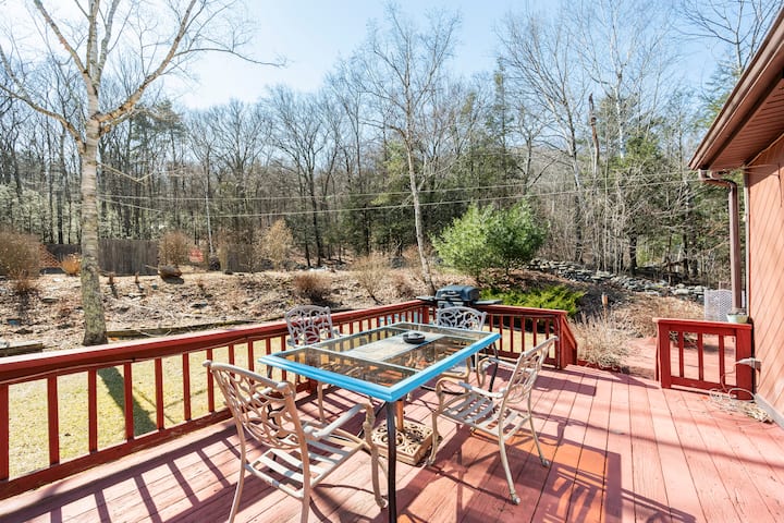 Private deck seating overlooking the Catskills