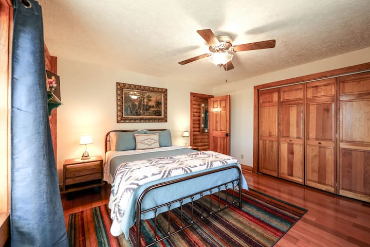 Bedroom 1, top floor.  From the new mattress and fine linens to the blackout curtains covering the northern and eastern views, you are in for a wonderful night's sleep! 
