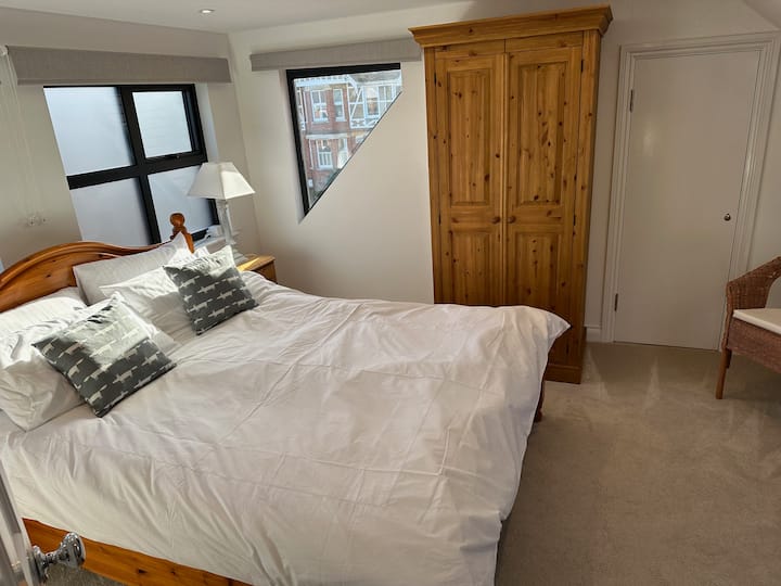 On the top floor, bedroom 5 has a king bed. 