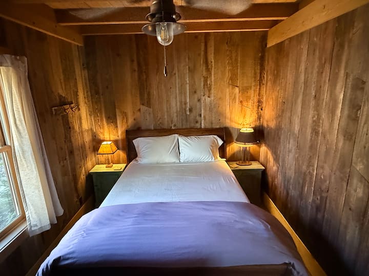 Bedroom with queen bed.