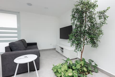 Successful Airbnb property: Modern Containers Glass Roof Solar Panels in Breñas