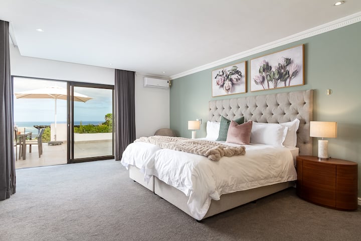 Dhoma e gjumit 2 ka 2 krevate tekë që mund të konvertohen në një "King"