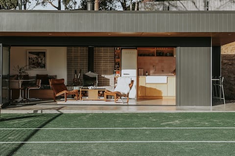 Popular Airbnb listing: The Chalet & The Pavilion - Tennis Court & Sauna in Glamorgan Spring Bay