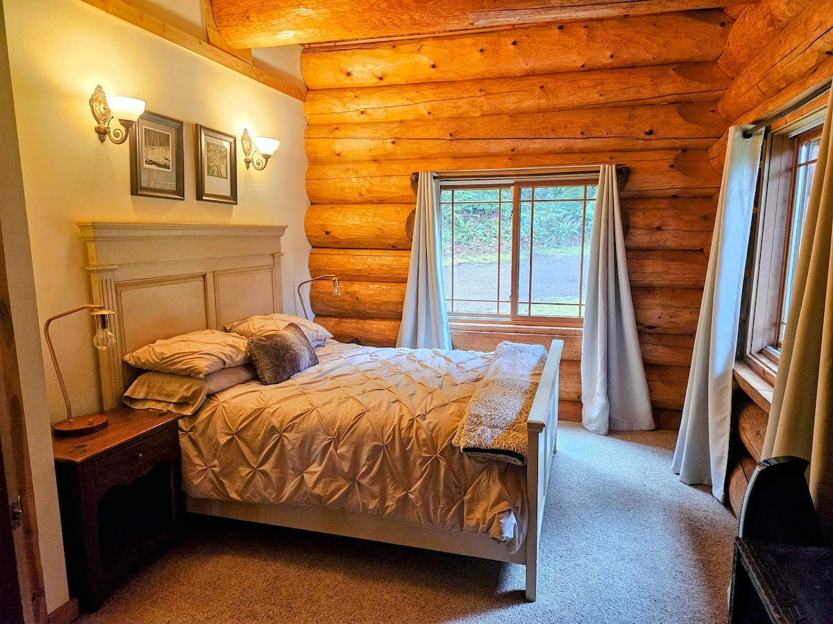 Queen bed on main level of the house.