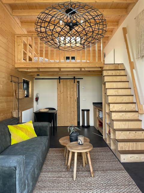 Tiny house with cozy pellet stove and hot tub.