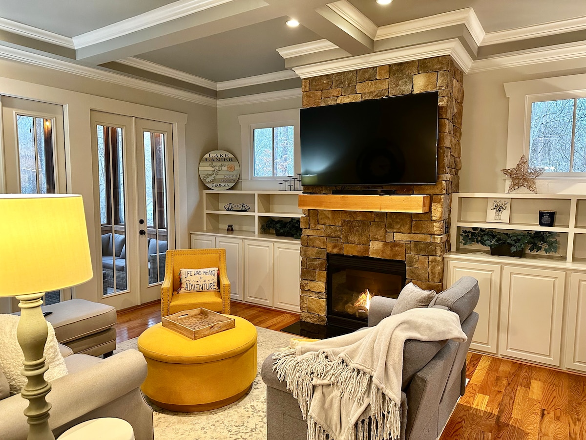 Oxhak prej guri me televizor 65"në nivelin kryesor është i përkryer për natën e filmit!