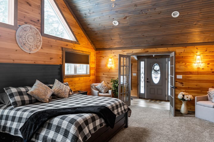 View from the doorway into the oversized Master bedroom with Cathedral ceilings