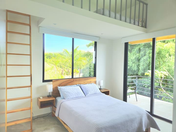 Third bedroom with queen size bed and full size bed in Loft.