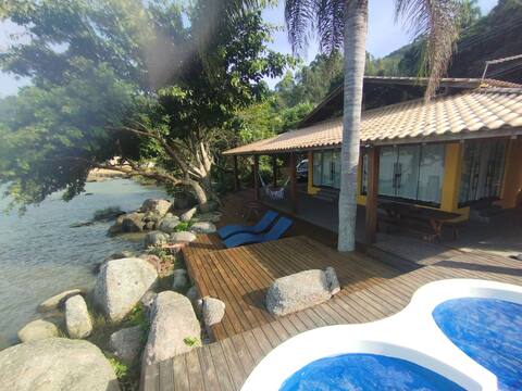 Casa foot in the water heated pool of Imaruí lagoon