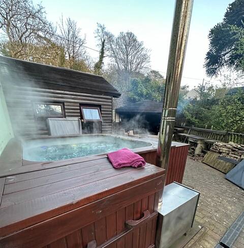 The hot tub by the waterfall     (fully inclusive)