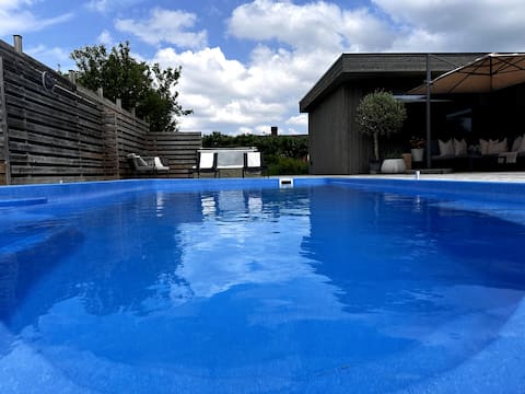 Beachfront modern villa in Viken with heated pool!