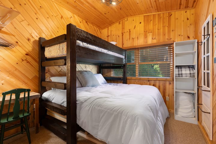 King bed with large twin above. Desk space for a little work space getaway if necessary.