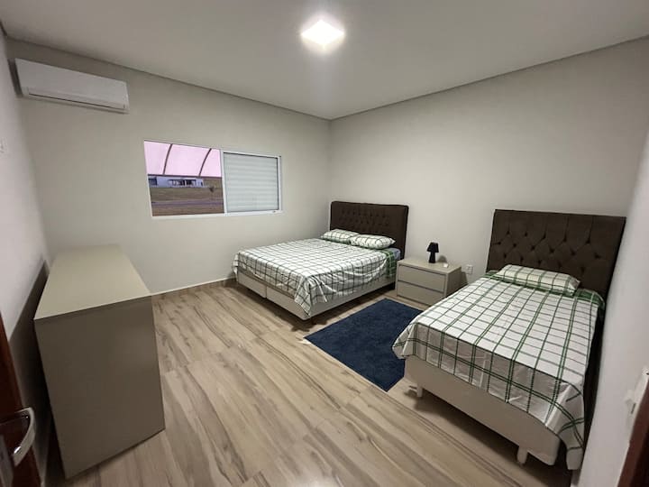 Camera 1  - Suite con  aria condizionata, letto matrimoniale e letto singolo