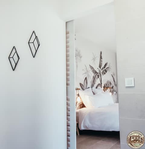 At the heart of a village with pool, AC and garden