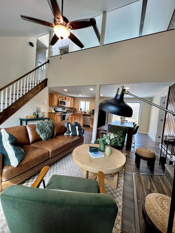 Open living area with the staircase to the upstairs bedrooms