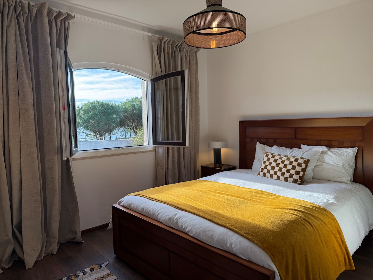 This suite is south facing, through the trees you can see the sea, has a nice comfortable double bed. When you wake up, just open the shutters and you can hear the birds discussing the next day.