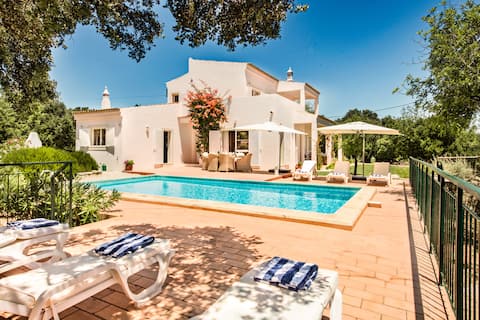 Successful Airbnb property: Stylish 4BR Hillside Villa w/ Pool & Sea View in Santa Bárbara De Nexe
