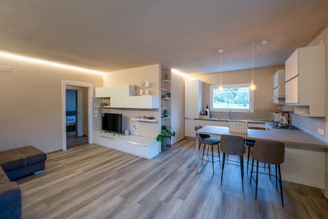 New apartment with garden and private parking