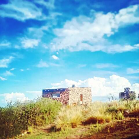 House at the foot of the mountain