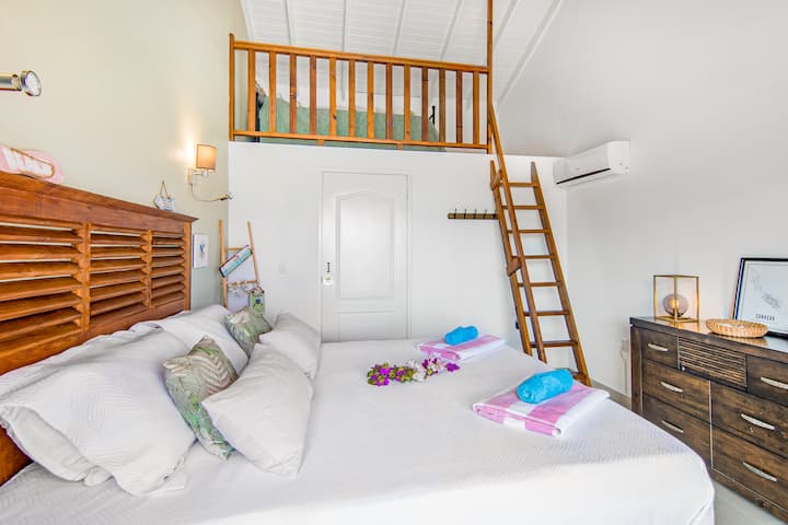 King-size bed and at the top of the loft a single bed 