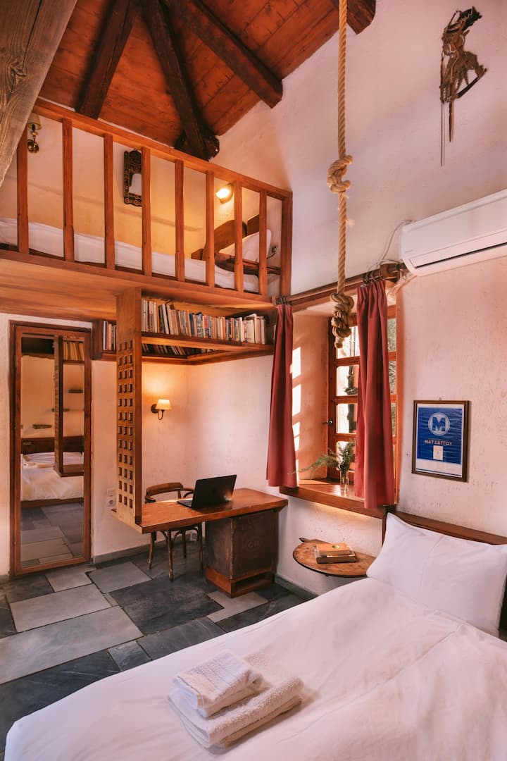 Children's room - one double bed plus two lofts, one with a small double (for a very slim couple!) and on the other side, a single bed