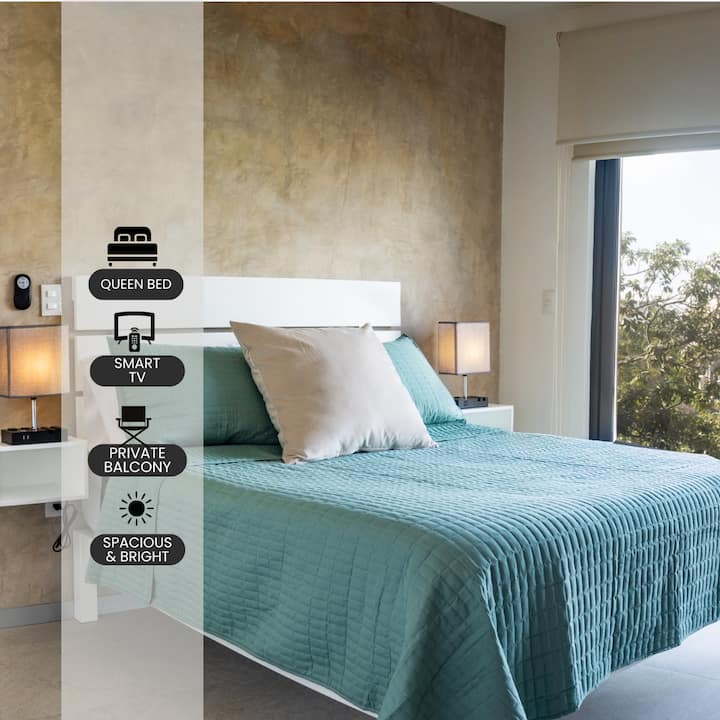 Very comfy, bright and spacious, street facing. Bedside charging stations are a guest favourite! 

Note:glass has been upgraded to minimize street sounds.