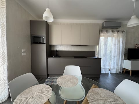 Successful Airbnb property: Studio "White" overlooking the pool private patio in Vilanija