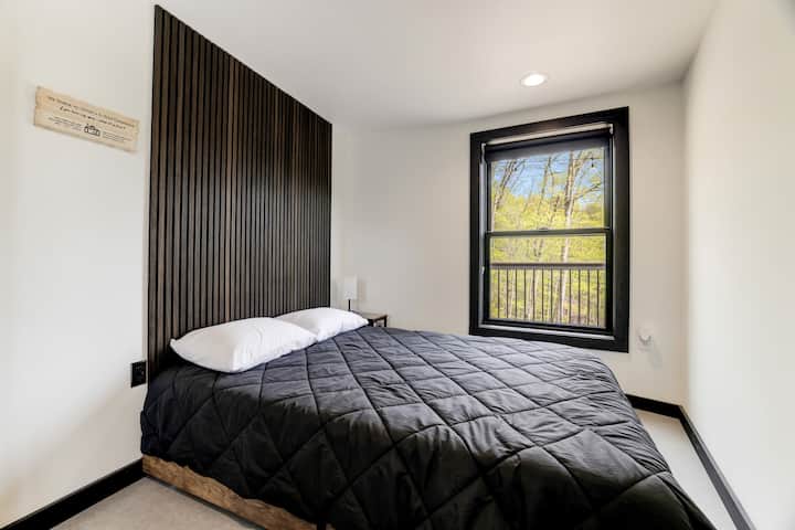 Bedroom 2 with Large Window and Closet System - Skyline Yurt

