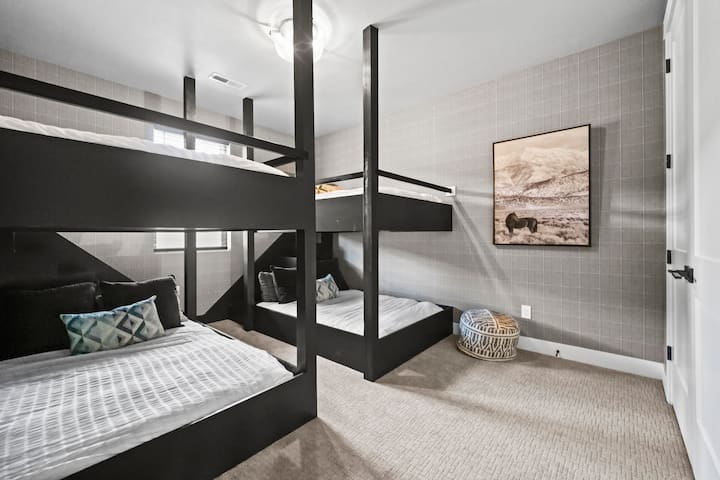 Kids (or adults!) will love this fun bunk room setup