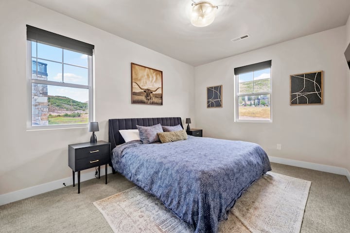 A restful space with natural light and mountain-inspired decor