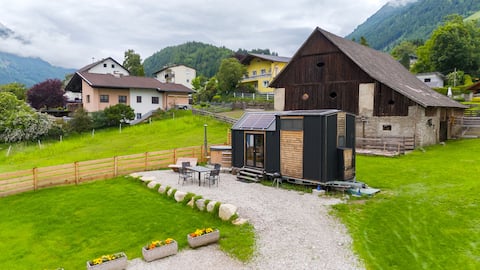 Tiny house near Lake Millstatt with hot tub