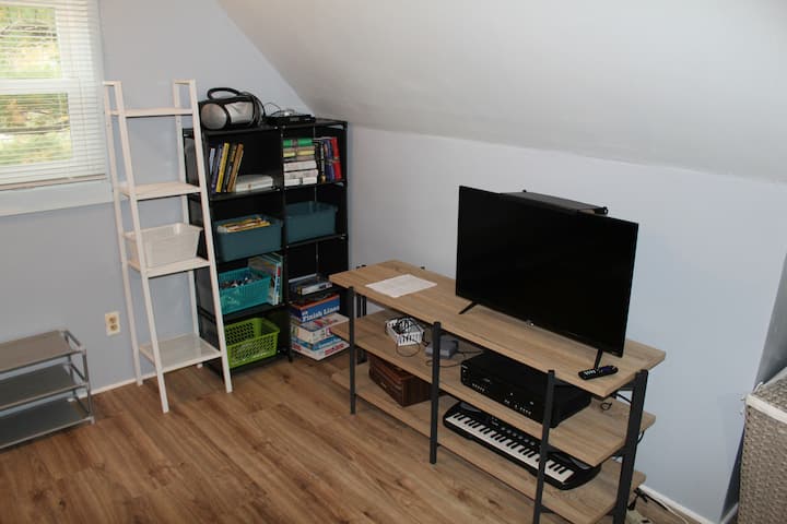 Área de entretenimiento en la sala de estar